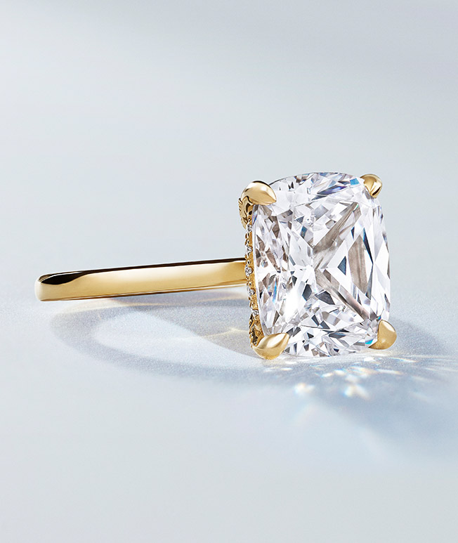 Yellow gold classic cut diamond engagement ring