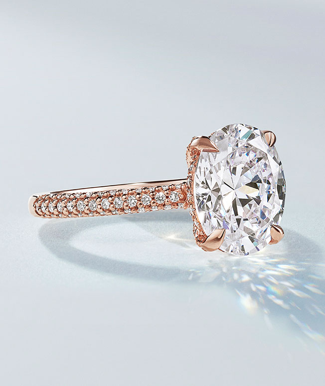 Rose gold hidden halo diamond engagement ring