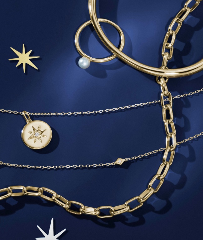 Assortment of gold fine jewelry.