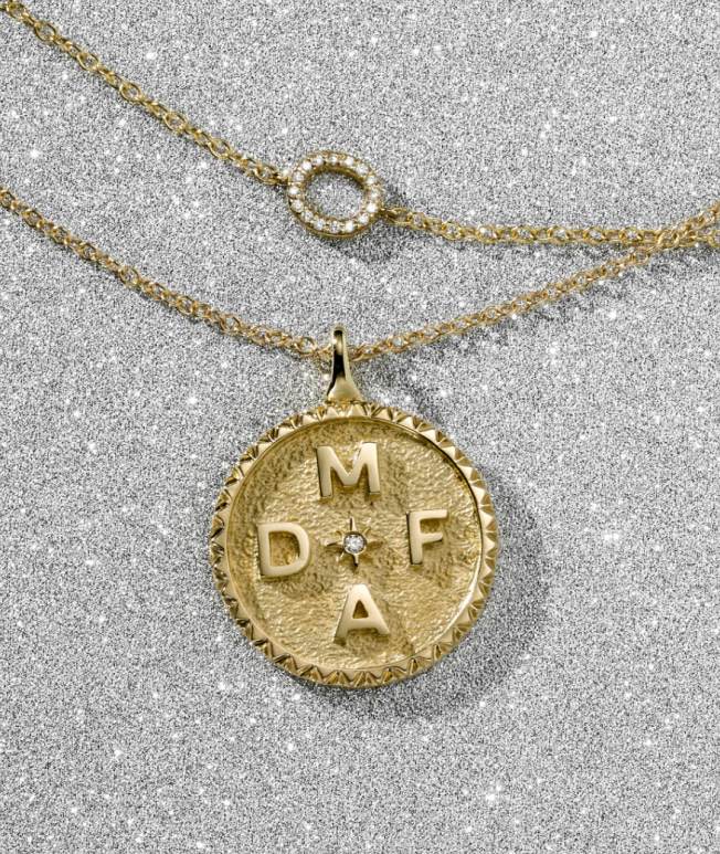 Gold personalized diamond necklace.