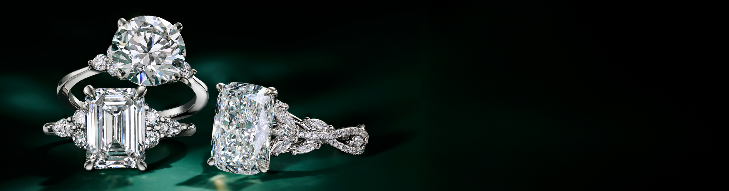 Assortment of diamond engagement rings from our Signature Collection