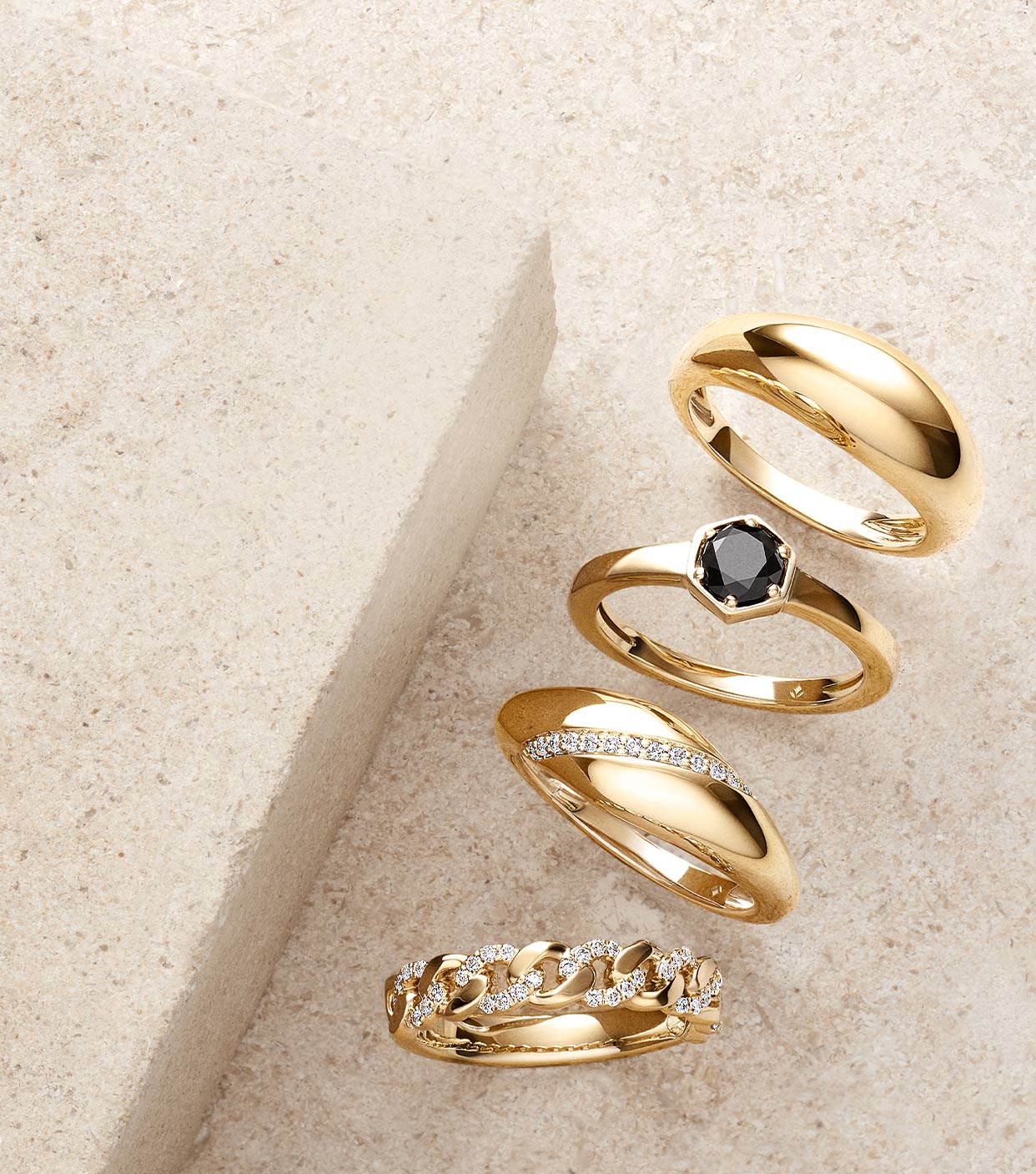 Mixed metal diamond and gemstone fashion rings.