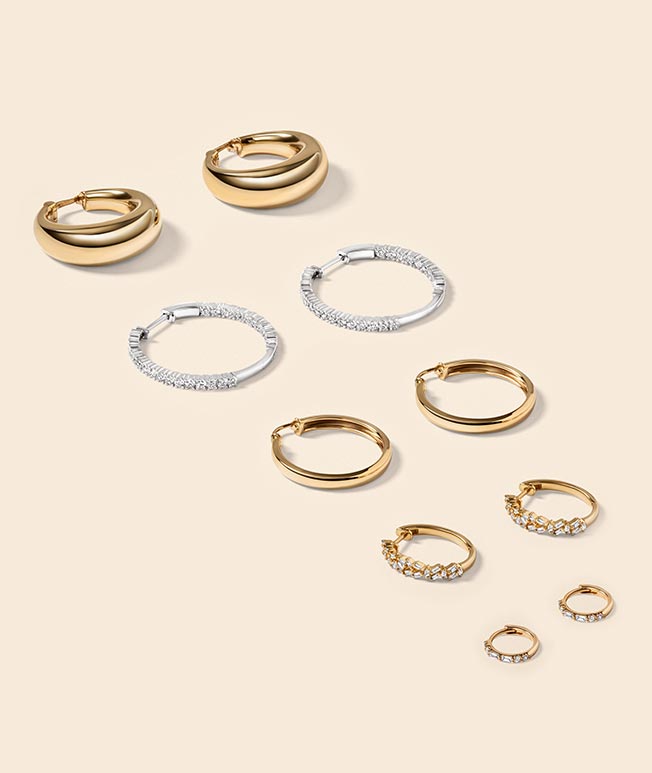 Variety of gold diamond hoop earrings