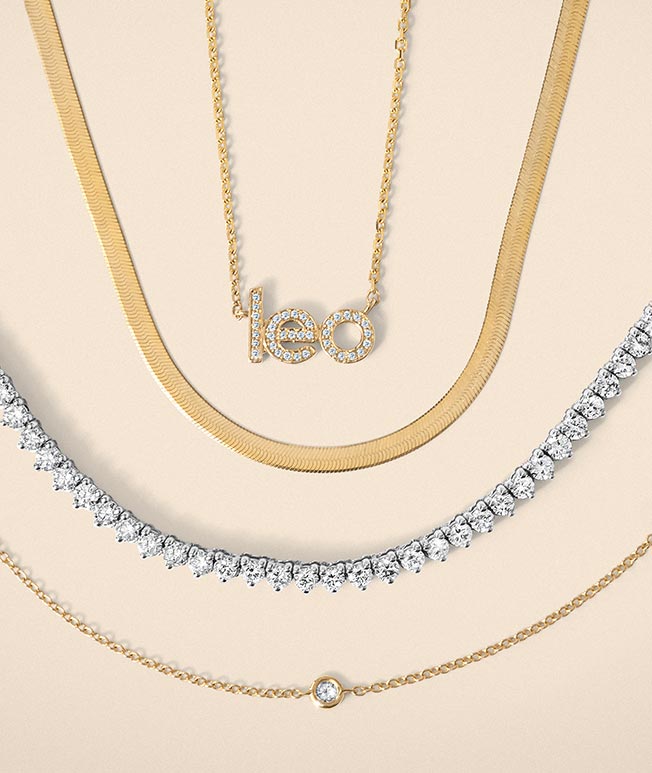 Assortment of gold diamond necklaces