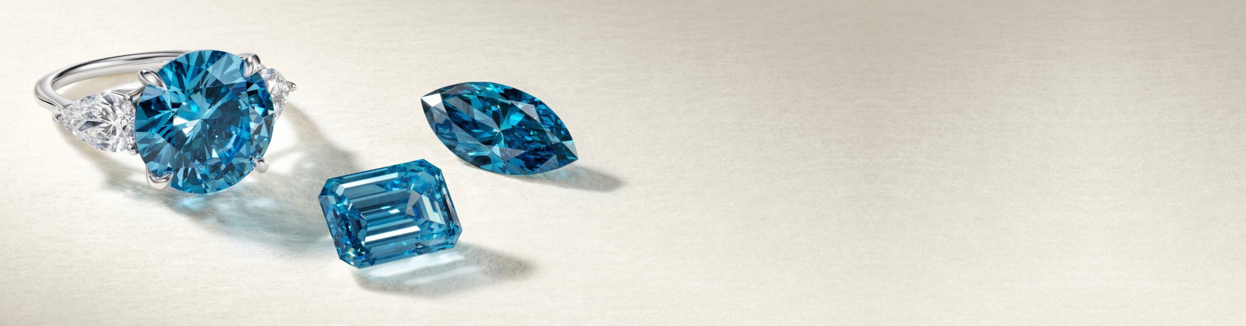 Malibu blue lab diamond engagement ring and loose diamonds.