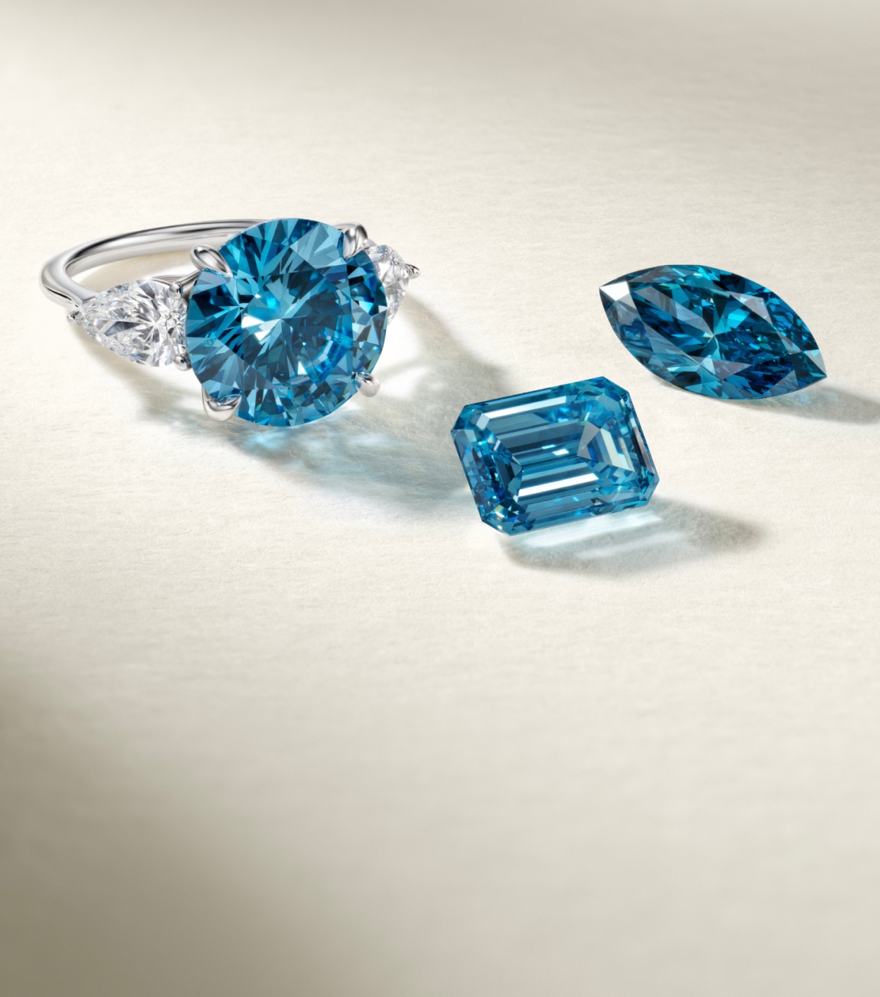 Malibu blue lab diamond engagement ring and loose diamonds.