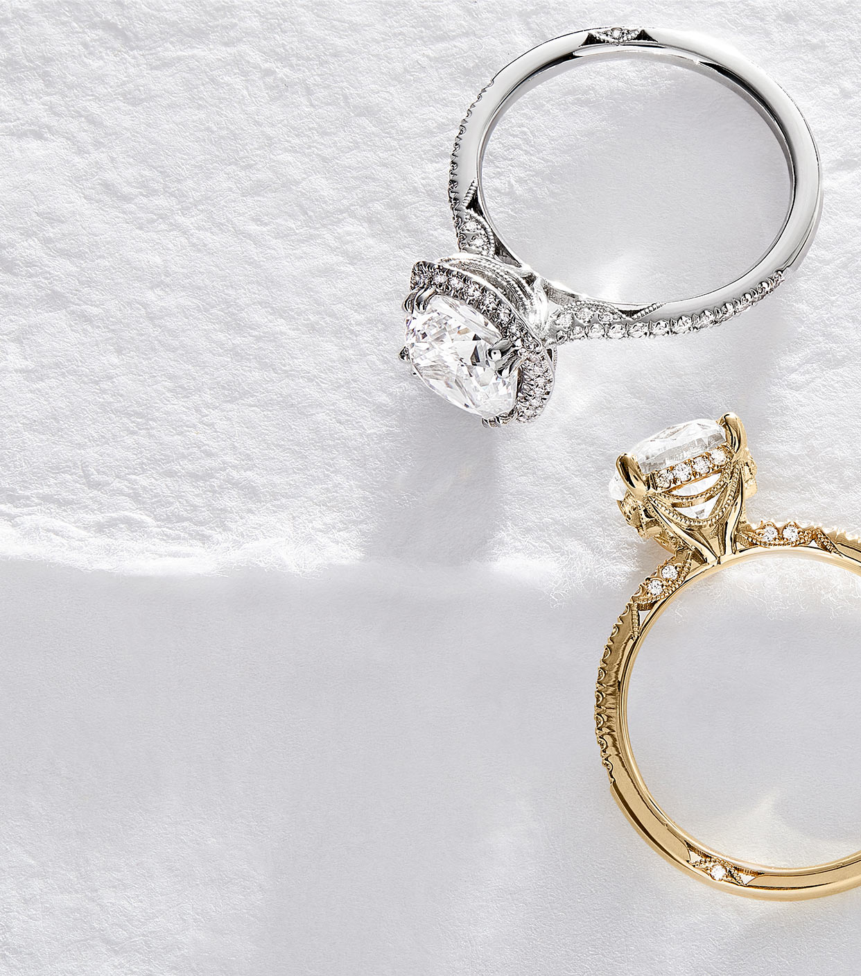 Pair of diamond engagement rings.