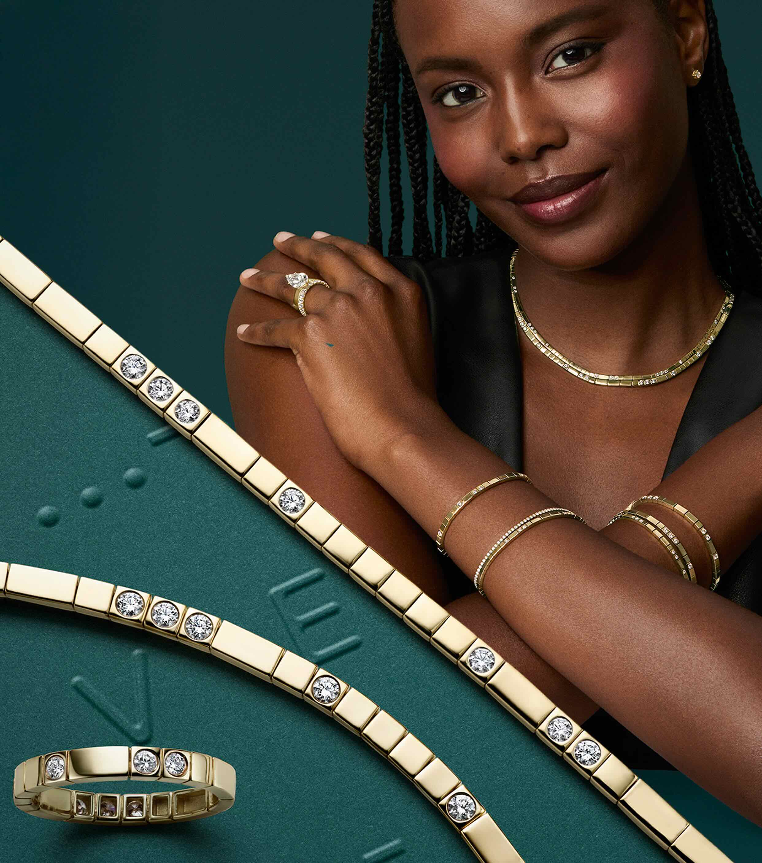 Model wearing fine jewelry from the Love Decoded collection.