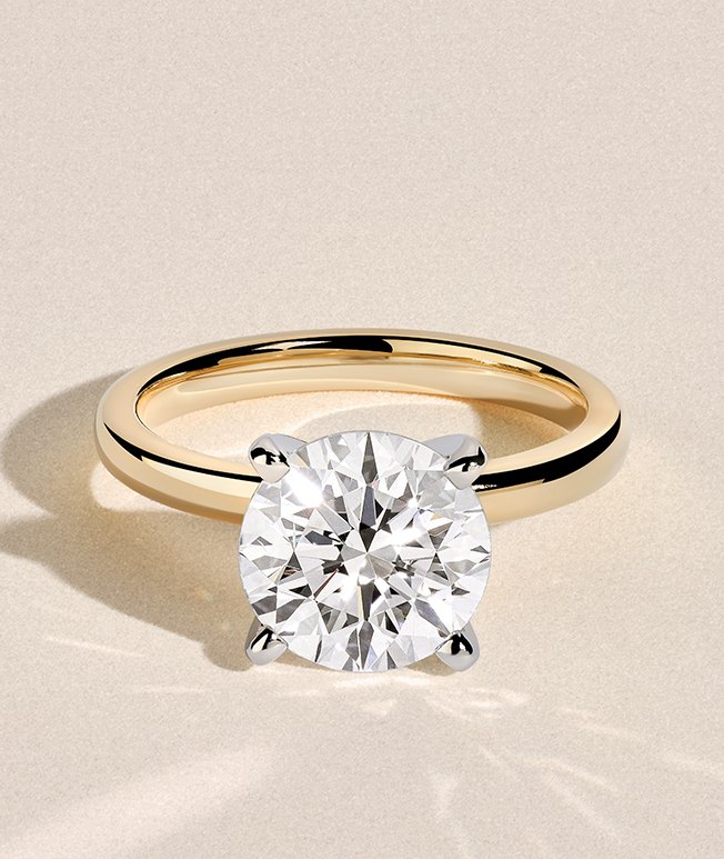 Round shaped diamond engagement ring