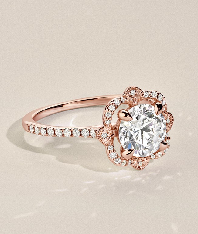 Rose gold round shaped halo diamond ring