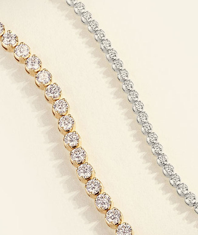 Gold and white gold diamond tennis bracelets