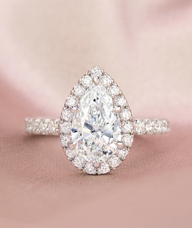 Pear shaped halo engagement ring