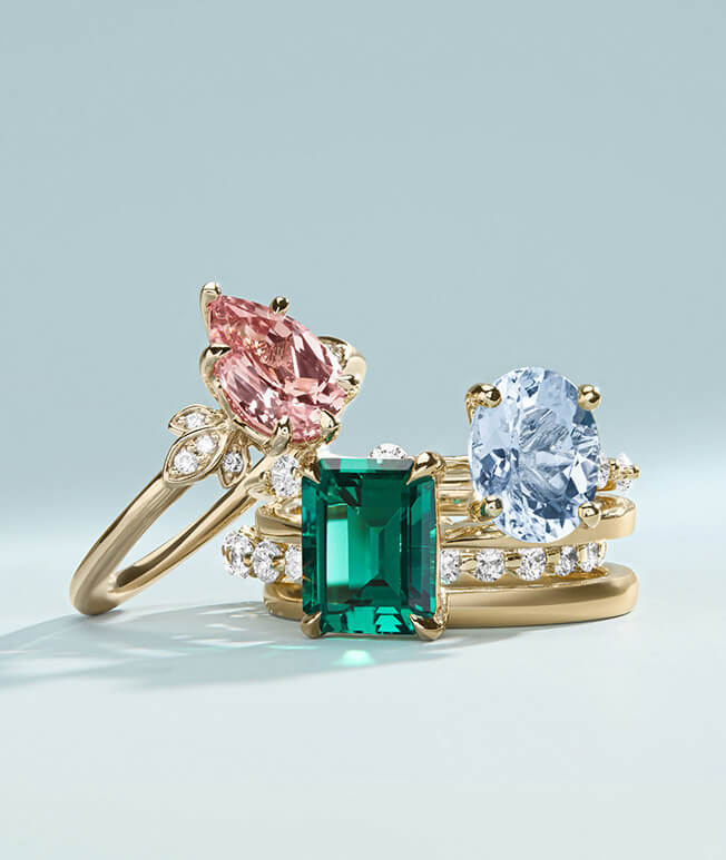 stack of gemstone engagement rings