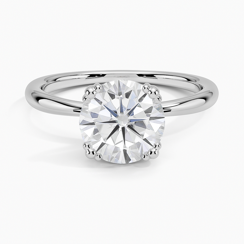 Moissanite Freesia Triple-Prong Solitaire Ring in 18K White Gold