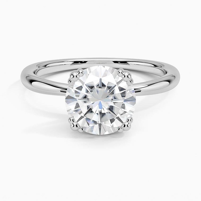 Moissanite Freesia Triple-Prong Solitaire Ring in 18K White Gold