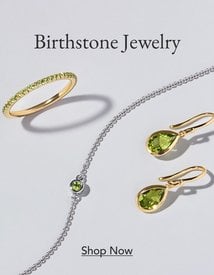 Assortment of fine jewelry highlighting August's birthstone, peridot.