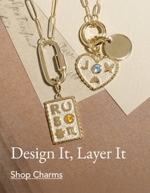 Gold customizable charms on two chain necklaces.