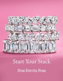 Stack of diamond eternity wedding rings.