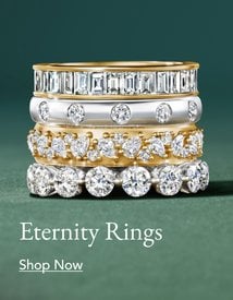 Stack of diamond eternity wedding rings.