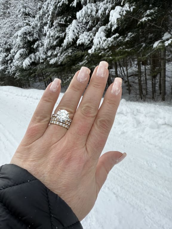Oval diamond ring on hand