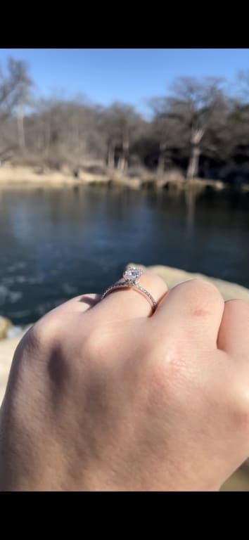 Oval diamond ring on hand