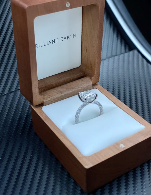 Oval diamond ring on hand