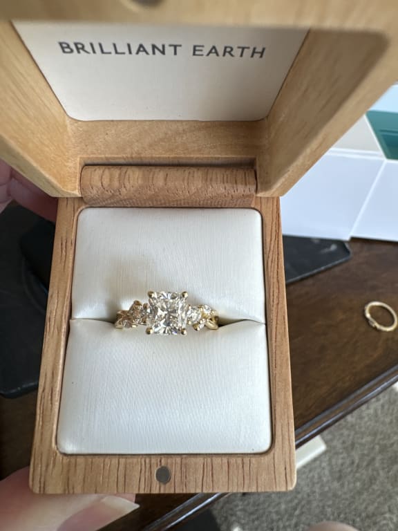 Oval diamond ring on hand