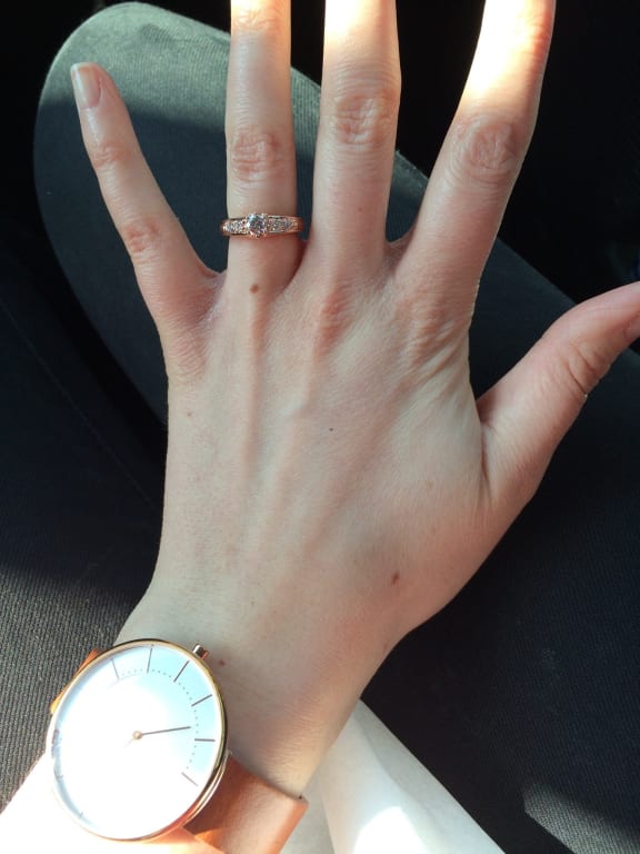 Oval diamond ring on hand