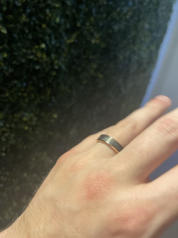 Oval diamond ring on hand