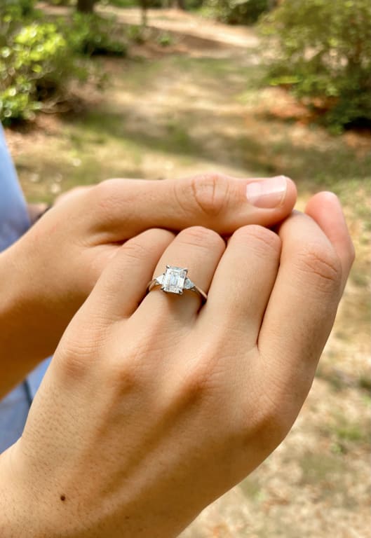 Oval diamond ring on hand