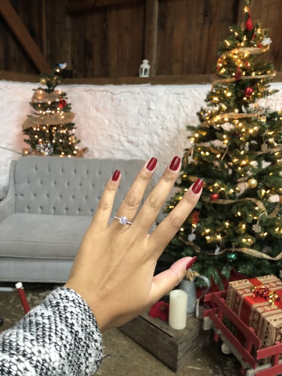 Oval diamond ring on hand