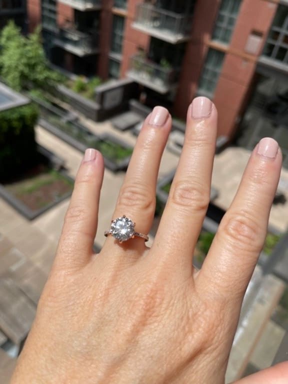 Oval diamond ring on hand