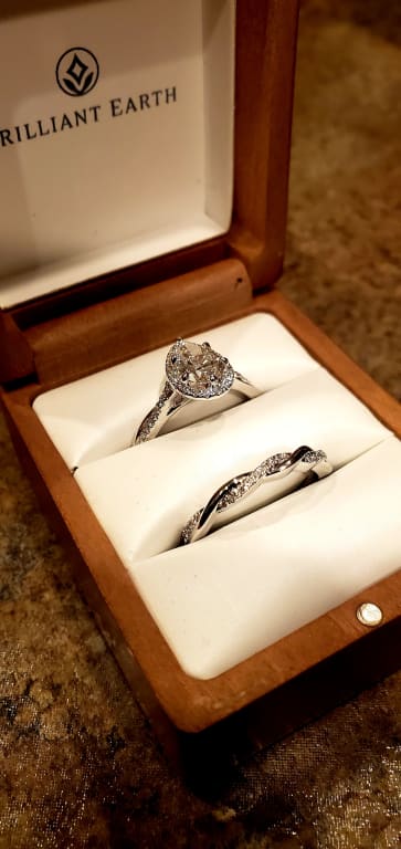 Oval diamond ring on hand