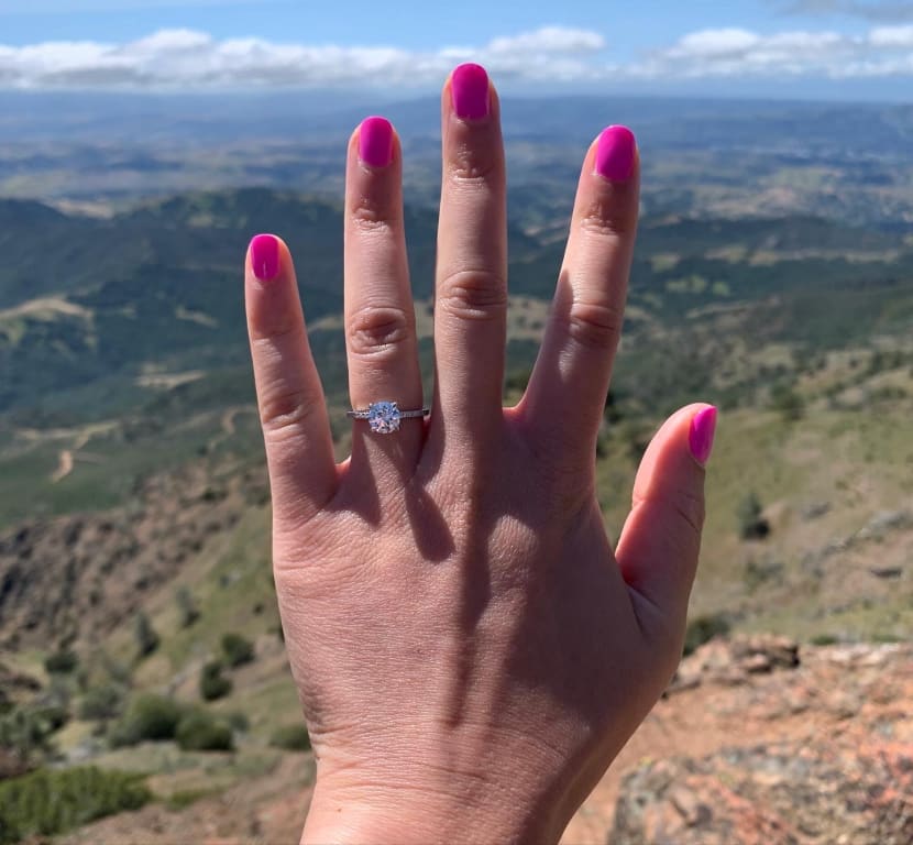 Oval diamond ring on hand