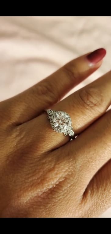 Oval diamond ring on hand