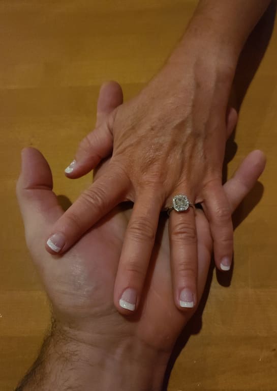 Oval diamond ring on hand