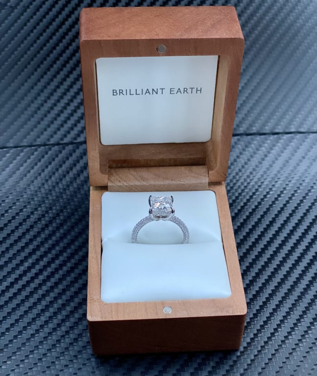 Oval diamond ring on hand