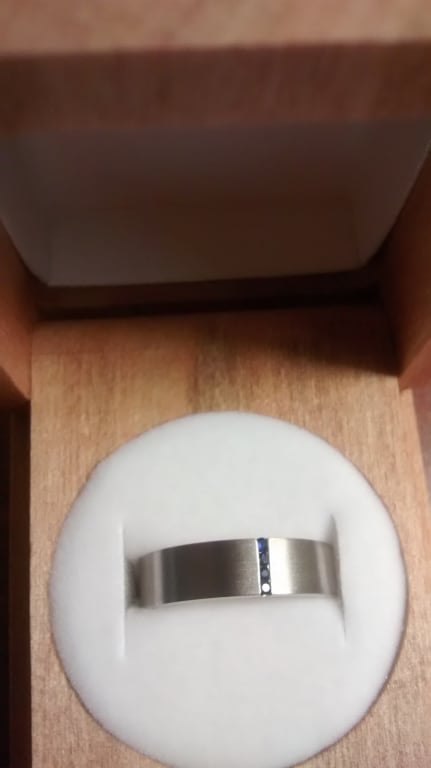 Oval diamond ring on hand