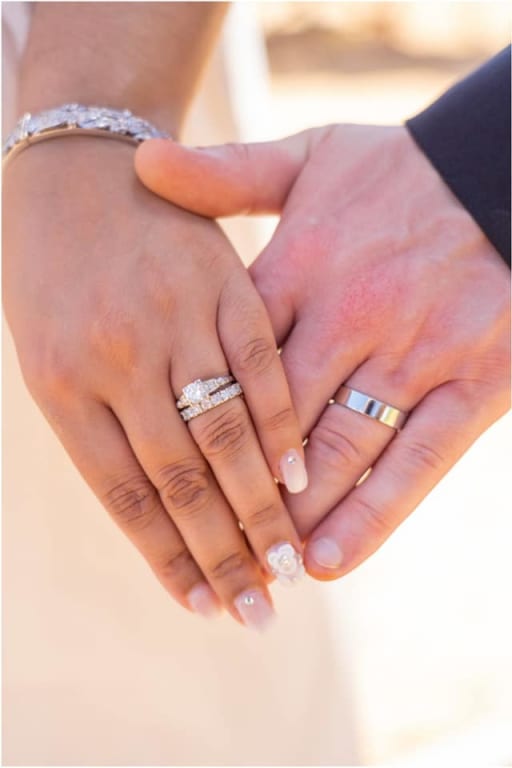 Oval diamond ring on hand
