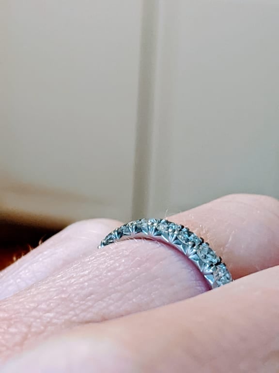 Oval diamond ring on hand