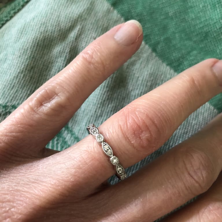 Oval diamond ring on hand