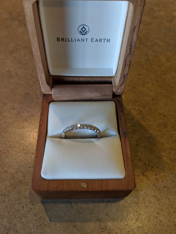 Oval diamond ring on hand