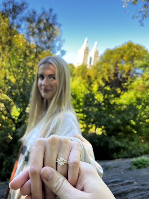 Oval diamond ring on hand