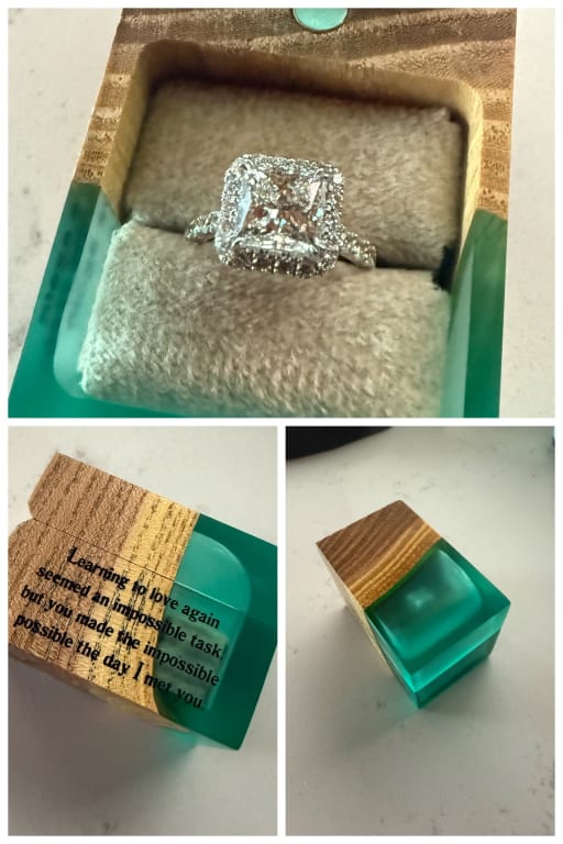 Oval diamond ring on hand