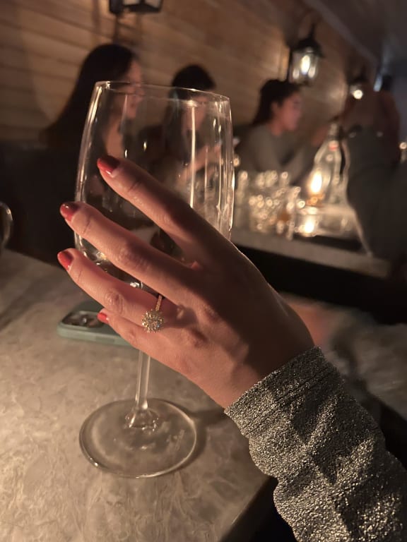 Oval diamond ring on hand