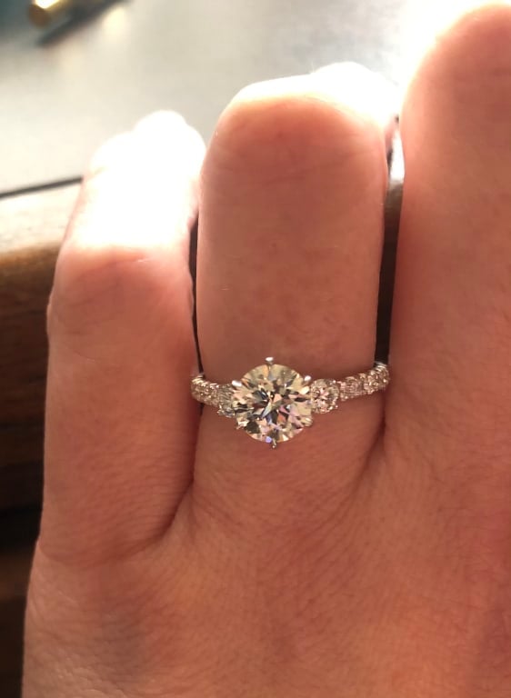 Oval diamond ring on hand