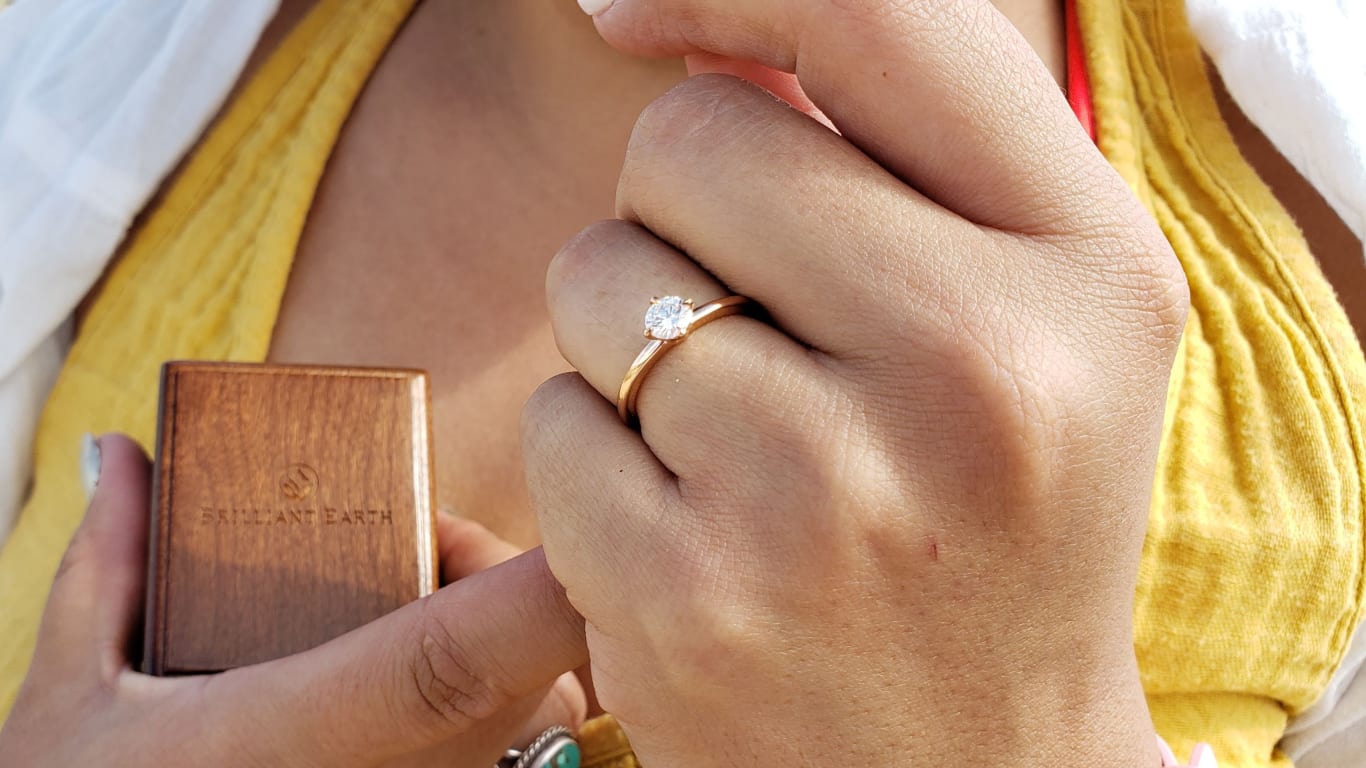 Oval diamond ring on hand