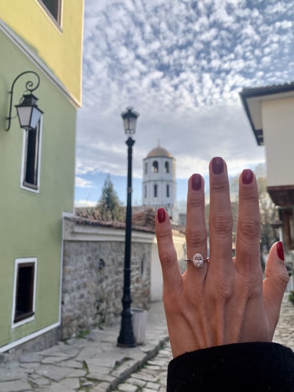 Oval diamond ring on hand