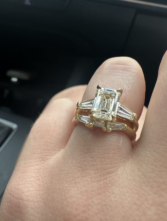 Oval diamond ring on hand