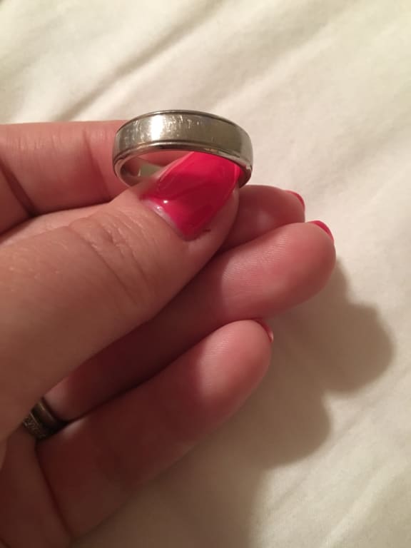 Oval diamond ring on hand